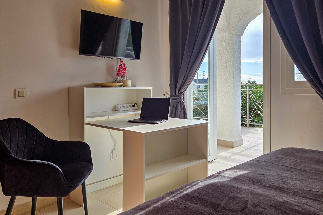 A clever home office in the master bedroom ...